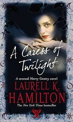 Book cover of A Caress Of Twilight by Laurell K. Hamilton