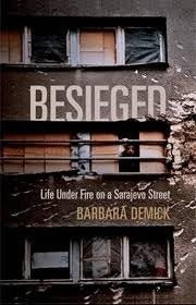 Book cover of Besieged: Life Under Fire on a Sarajevo Street by Barbara Demick