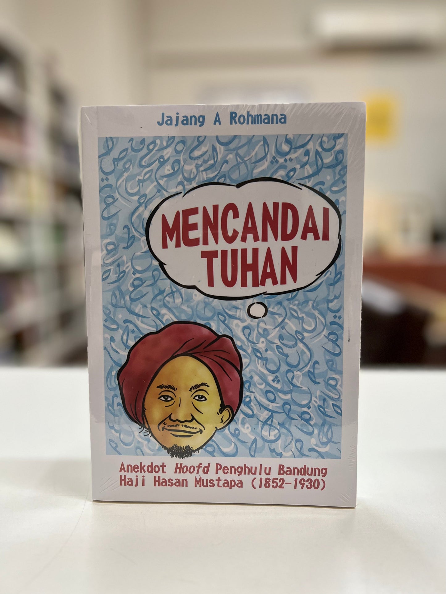 Book cover of Mencandai Tuhan by Jajang A Rohmana