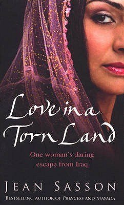 Book cover of Love In A Torn Land by Jean Sasson