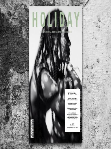 Book cover of Holiday Issue 387 Spring/Summer 2021 by Sean Thomas (Contrib.), Paul Kooiker (Contrib.), Matthieu Salvaing (Contrib.), Quentin de Briey (Contrib.), Krisztián Éder (Contrib.), Douglas Irvine (Contrib.), Oliver Hadlee Pearch (Contrib.), Karim Sadli (Contrib.), Oscar Coop-Phane (Contrib.), Gabriella Ghermandi (Contrib.), Nicolas Zeisler (Contrib.), Bridget Cleary (Contrib.), Jean-Christophe Collin (Contrib.), Mariam Senna Asfa Wossen (Contrib.), Thomas Chatterton Williams (Contrib.)