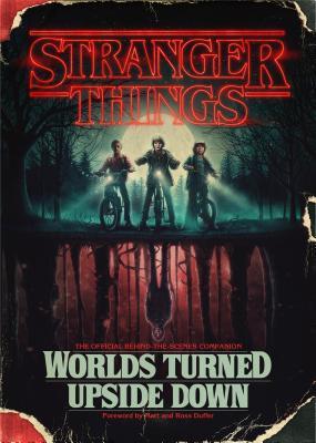 Book cover of Stranger Things: Worlds Turned Upside Down: The Official Behind-The-Scenes Companion by Gina McIntyre, Matt Duffer (Foreword), Ross Duffer (Foreword)