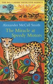 Book cover of The Miracle at Speedy Motors by Alexander McCall Smith