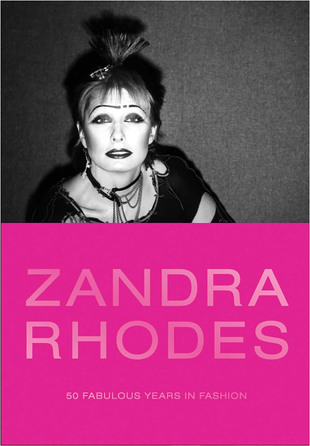 Book cover of Zandra Rhodes: 50 Fabulous Years In Fashion by Suzy Menkes (Foreword), Marylou Luther (Contrib.), Anna Sui (Contrib.), Joan Agajanian Quinn (Contrib.), Rajeev Sethi (Contrib.), Helena Matheopoulos (Contrib.), Mary Schoeser (Contrib.), Pierpaolo Piccioli (Contrib.), Iris Apfel (Preface), Dennis Nothdruft (Ed.), Zandra Rhodes (Ed.)