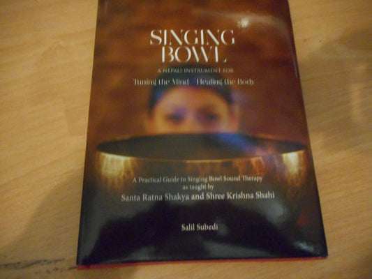 Book cover of Singing Bowls: A Nepali Instrument For Tuning The Mind Healing The Body by Salil Subedi