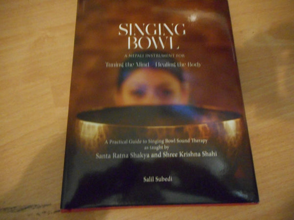 Book cover of Singing Bowls: A Nepali Instrument For Tuning The Mind Healing The Body by Salil Subedi