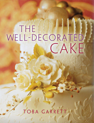 Book cover of The Well-Decorated Cake by Toba Garrett, Steven Mark Needham (Photographs), Christine  Mathews (Illustrations)