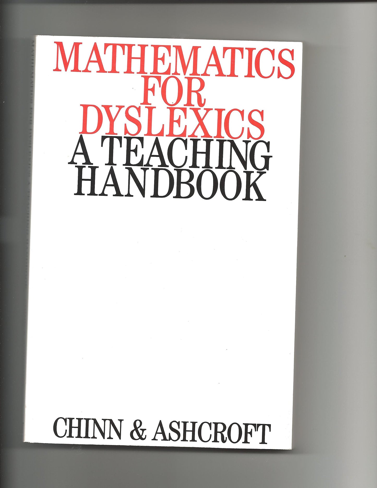 Book cover of Mathematics For Dyslexics: A Teaching Handbook by Stephen J Chinn
