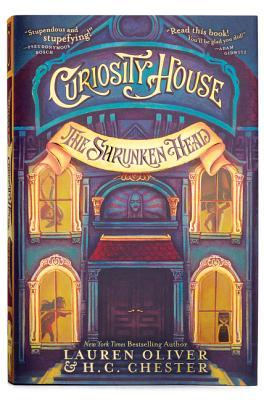 Book cover of Curiosity House: The Shrunken Head by Lauren Oliver, H.C. Chester, Benjamin Lacombe (Illus.)
