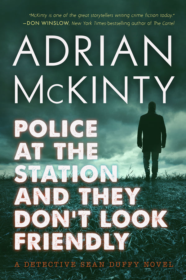 Book cover of Police At The Station And They Don't Look Friendly by Adrian McKinty
