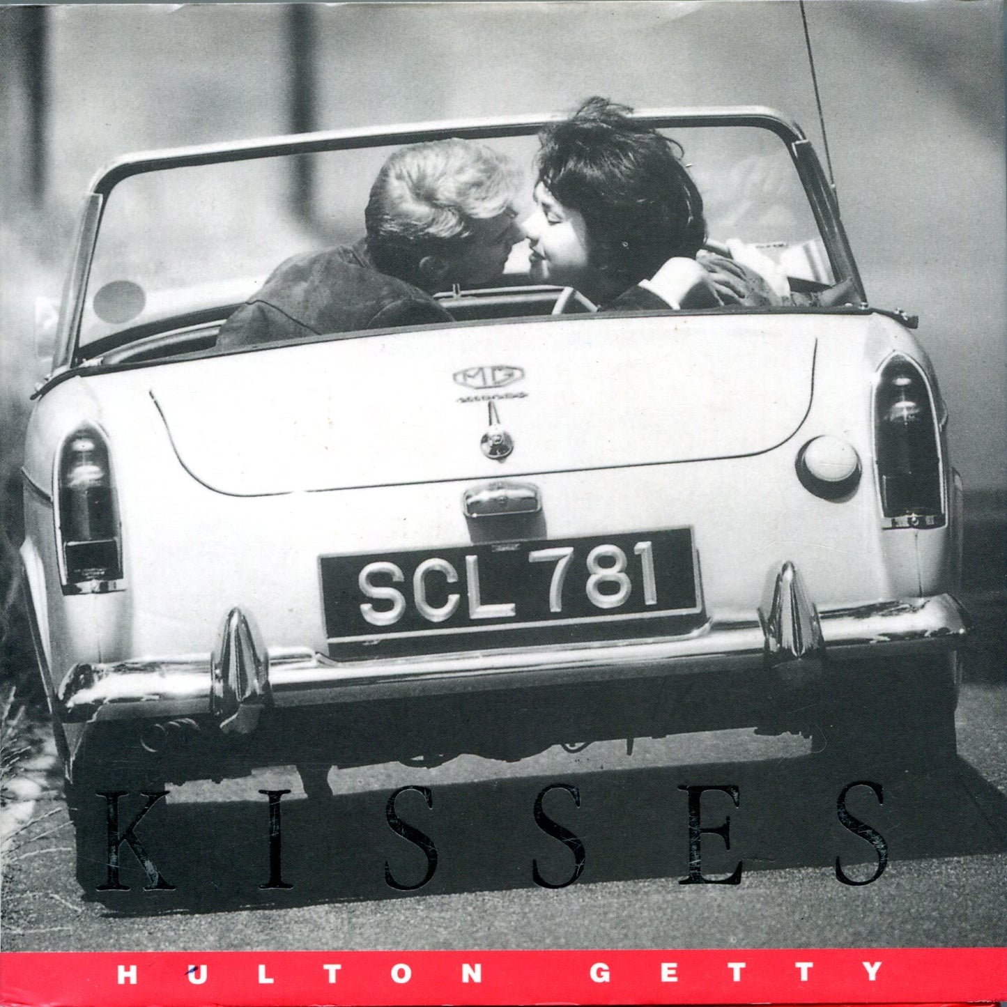 Book cover of Kisses: A Photographic Celebration by Suzi Green (Text and picture research)
