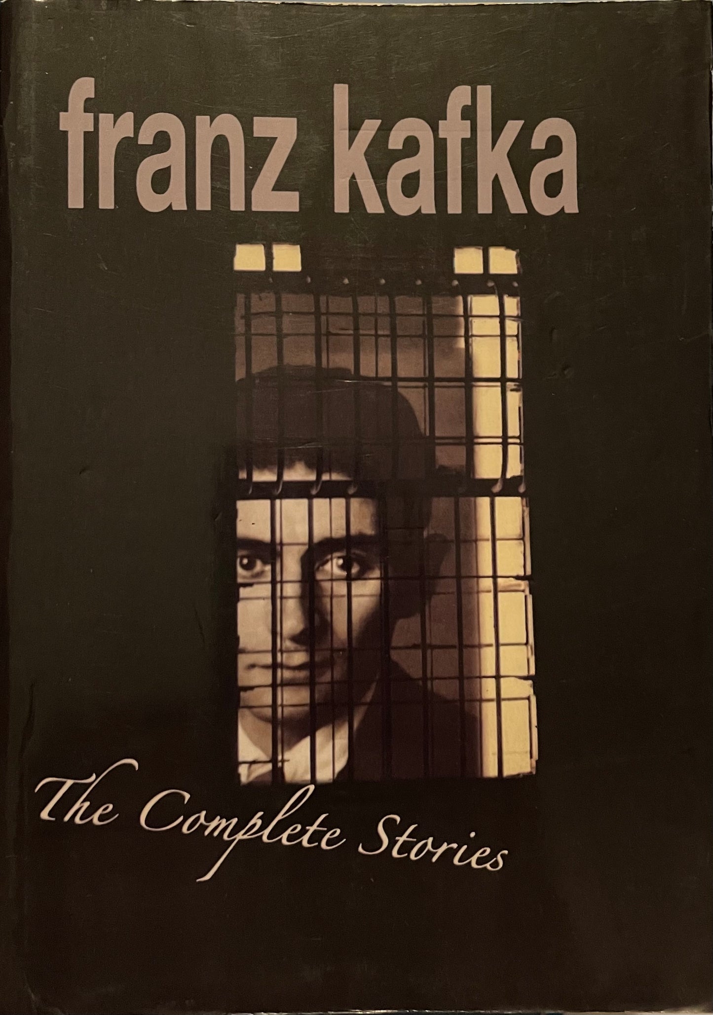 Book cover of The Complete Stories by Franz Kafka, John Updike (Foreword), Nahum N. Glatzer (Ed.), Willa Muir (Trans.), Edwin Muir (Trans.), Tania Stern (Trans.), James Stern (Trans.), Ernst Kaiser (Trans.), Eithne Wilkins (Trans.)