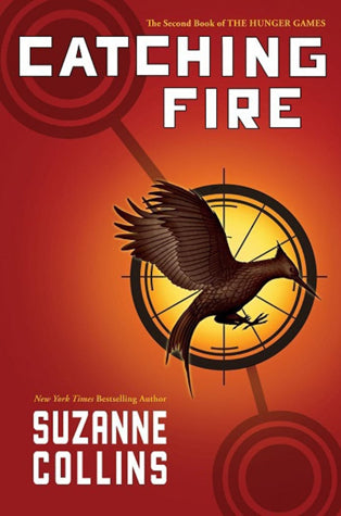 Book cover of Catching Fire by Suzanne Collins