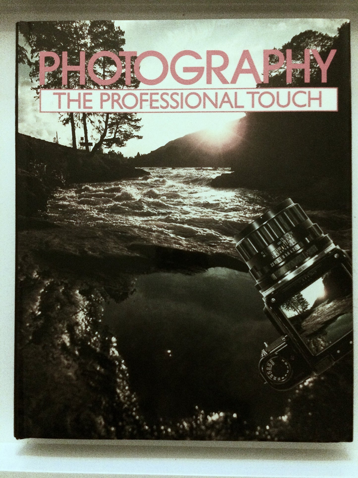 Book cover of Photography - The Professional Touch by Bob Saxton