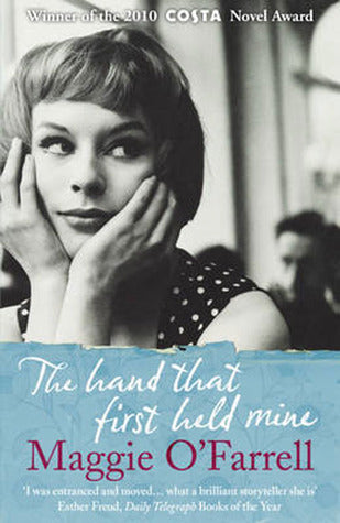 Book cover of The Hand That First Held Mine by Maggie O'Farrell