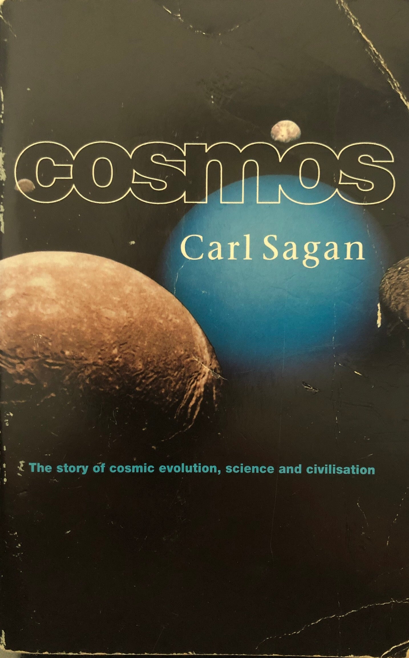 Book cover of Cosmos: The Story of Cosmic Evolution, Science and Civilisation by Carl Sagan